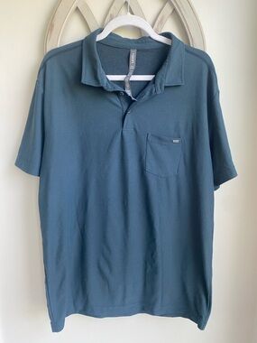 Vuori  100% Performance Piqué Ace polo with a pocket